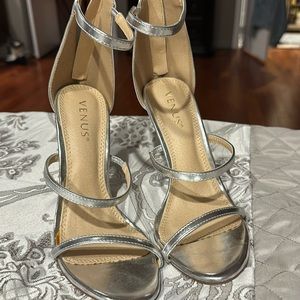 New never worn sexy silver sandals .. high heels